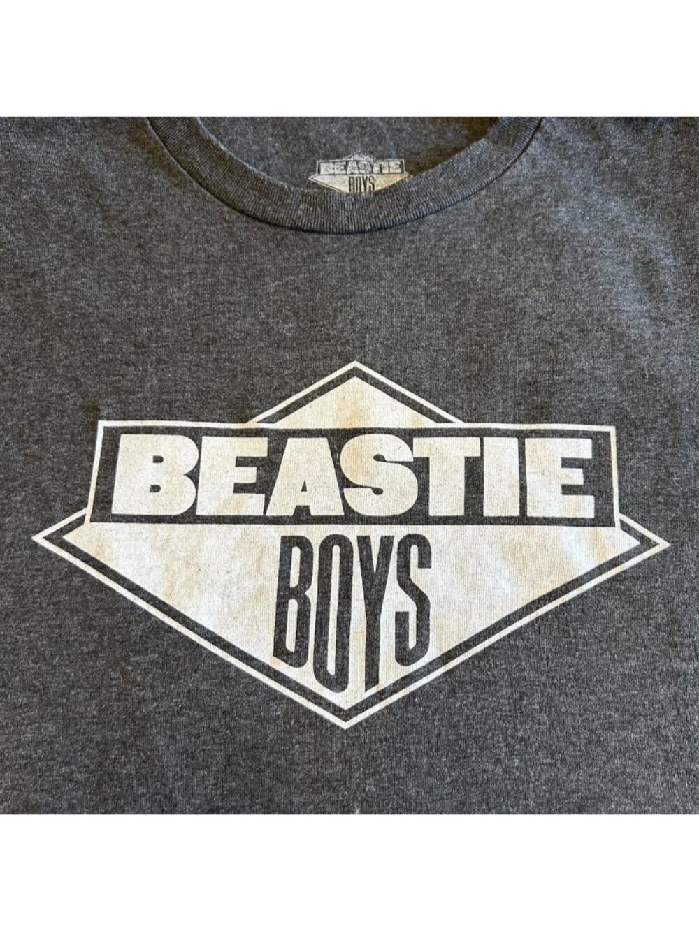 Grey and white Beastie Boys ill communication logo